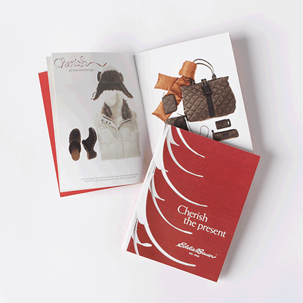 Cherish Holiday Brochure with cover and inside pages showing cream down vest and down hand bag.