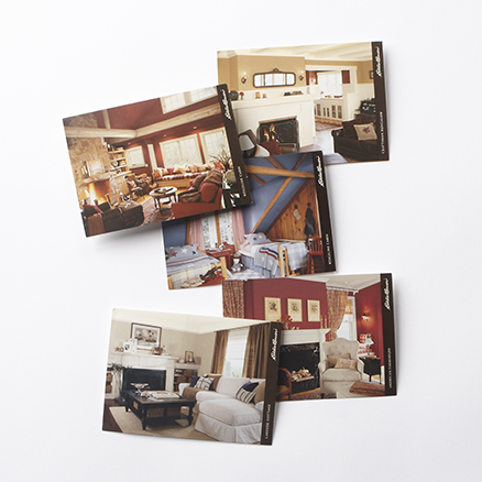 Five postcards; four living room and one bedroom photos to represent different paint color options